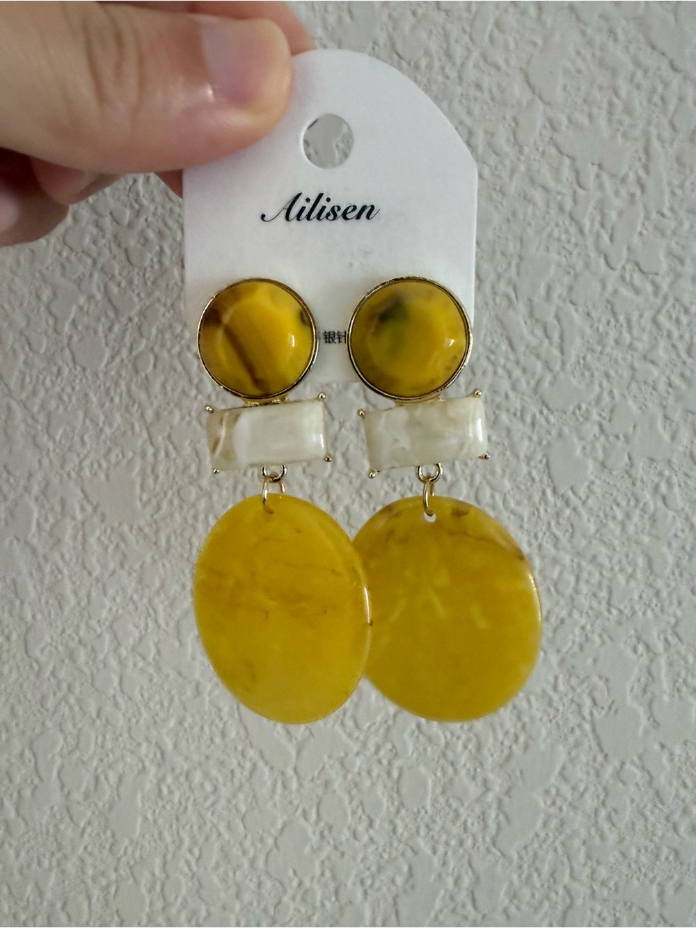 Women’s yellow round shaped dangle earrings